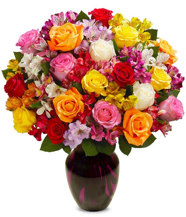 A bouquet featuring mixed roses and alstroemerias, with an optional vase.